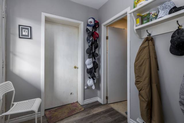 Mudroom: Hooks and a side entry for boots and gear